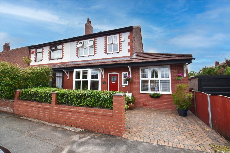 An immaculate extended family home with a stunning south facing garden