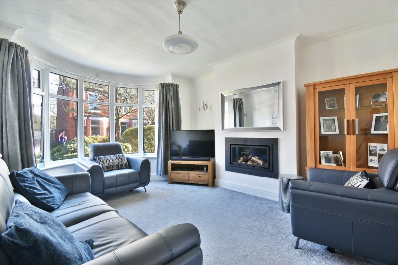 Spacious three bedroom semi-detached family home on a generous plot with extension potential, driveway and detached garage.