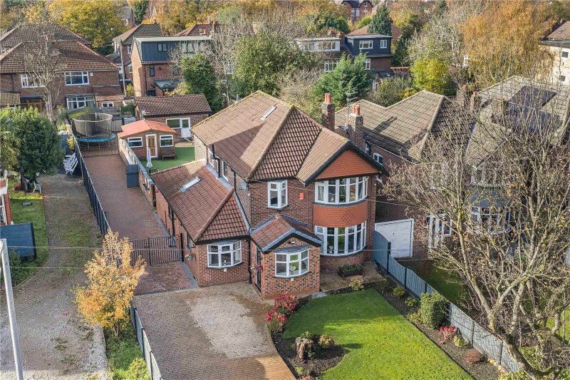 A substantial four bedroom detached family home set on an outstanding plot with extensive parking and superb living space.