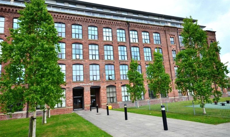 A spacious three bedroom duplex apartment with stunning golf course views in a converted mill development.