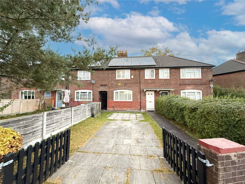 A Beautifully Presented Mid-Terrace With Driveway