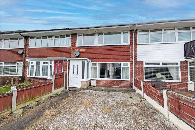 Three-bedroom home with renovation potential, open-plan kitchen/dining space and detached garage.