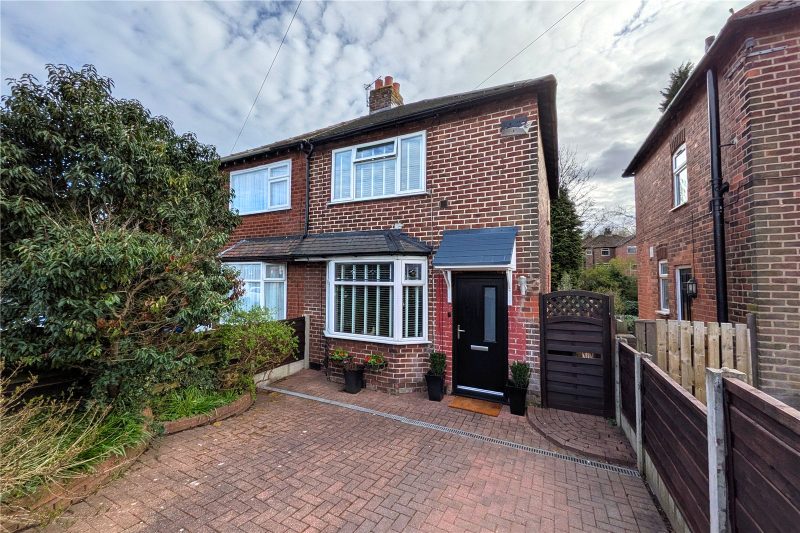 Well-presented two bedroom semi-detached home with large south-facing garden, home office and off-road parking.