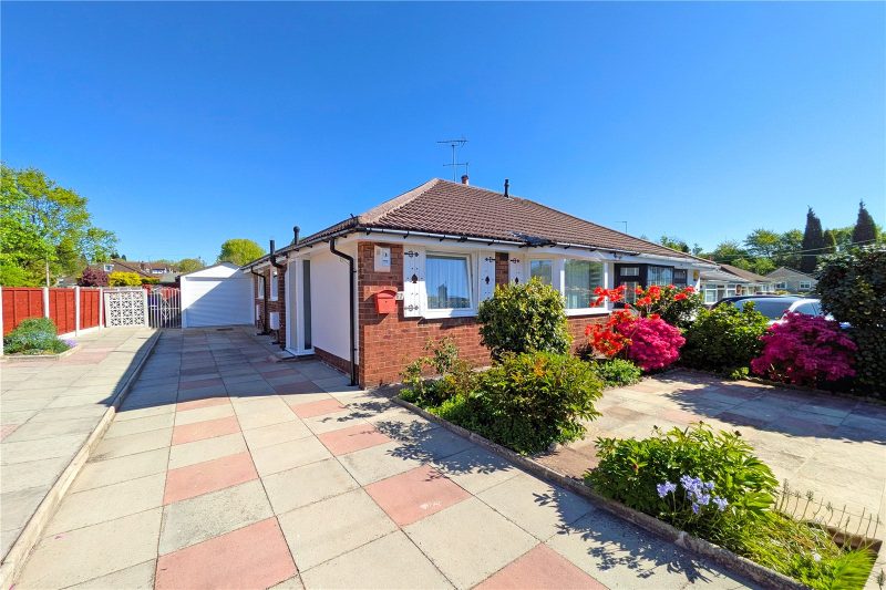 Stunning two bedroom semi-detached bungalow with driveway, garage and landscaped gardens.